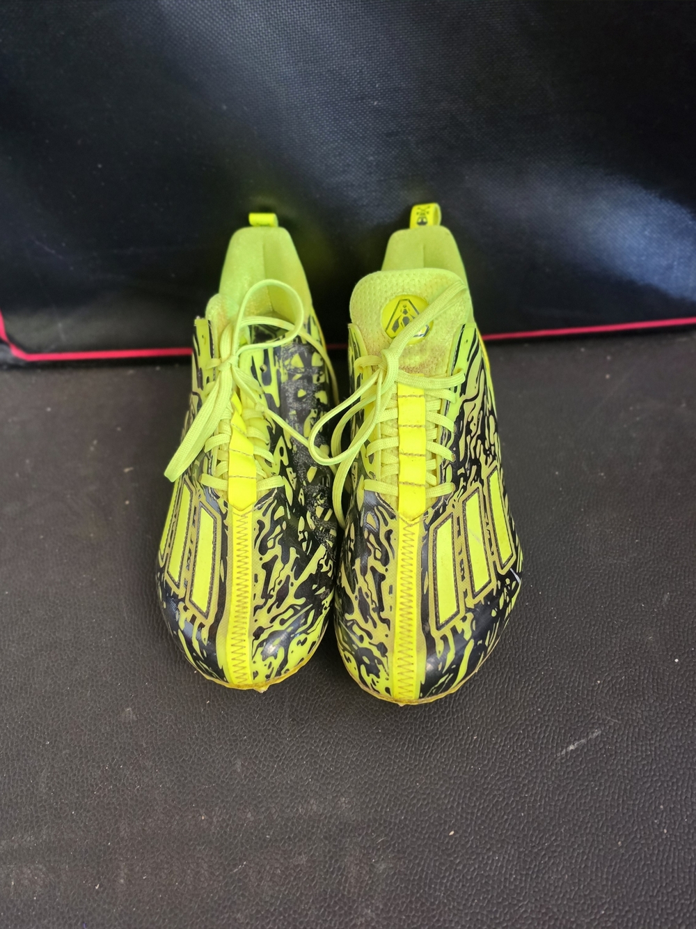 Men's Adidas Adizero 12.0 Poison football cleats in the Solar Yellow/Core Black